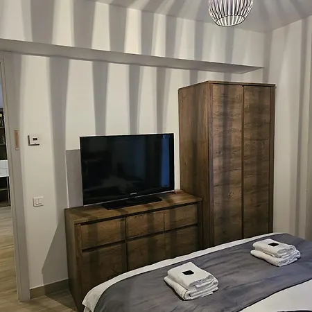 Апартаменти District Cuza 99 Бухарест