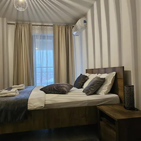 Апартаменти District Cuza 99 Бухарест